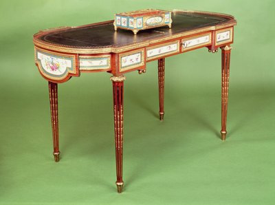 Louis XVI bureau plat with pale tulipwood veneer and shaped ormolu gallery, attributed to Martin Carlin by French School